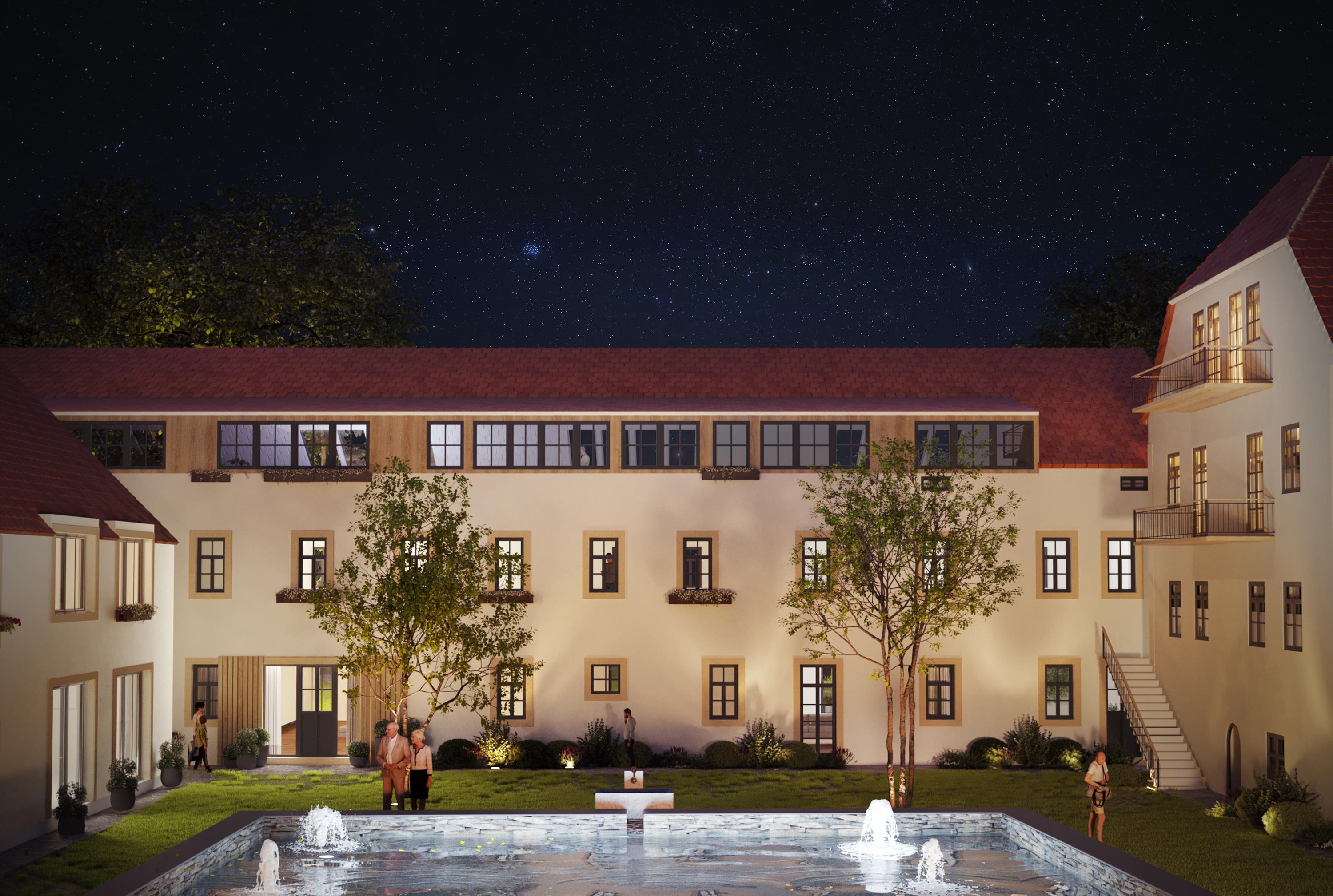 Rittergut Seifersdorf bei Nacht — beleuchteter Innenhof