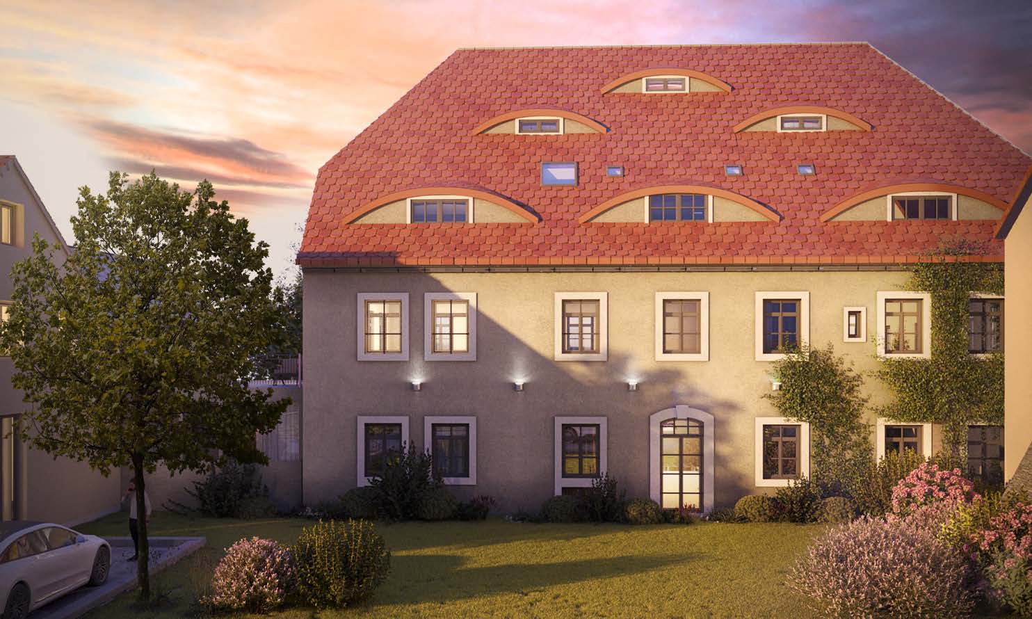 Rittergut Seifersdorf — Hauptgebäude mit Dachgauben im Sonnenuntergang